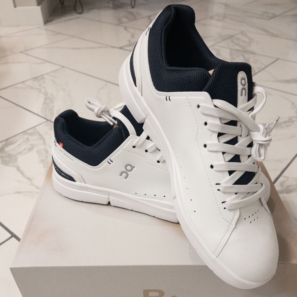 On Running White and Black Sneakers
